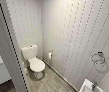Three-Bedroom Home with Modern Comforts - Photo 3