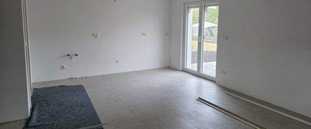 Erstbezug! Hochwertige Familienwohnung über 2 Ebenen! Terrasse, Garten, EBK! - Foto 1