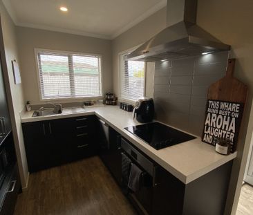 This tidy 2-bedroom, 1-bathroom brick home in Frankton offers comfo... - Photo 5