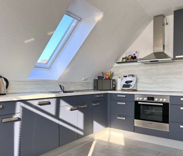 Gemütliche Dachgeschosswohnung mit Balkon in ruhiger und dennoch ze... - Photo 6