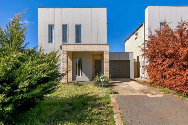 Fresh, Modern & Low-Maintenance Living in a Prime Location - Photo 1