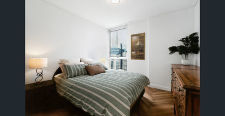 A Statement in Style | Exquisitely Renovated CBD Apartment with Spectacular Views - Photo 4