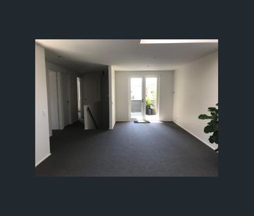 Stylish Two-Level Townhouse in a Quiet, Convenient Location - Photo 2