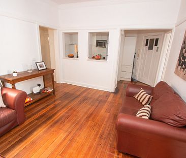 CONVENIENTLY LOCATED FOUR BEDROOM APARTMENT. - Photo 1