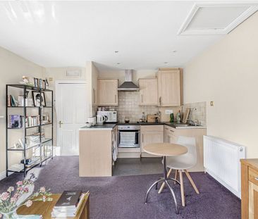 A first floor furnished flat in the heart of the bustling main stre... - Photo 5