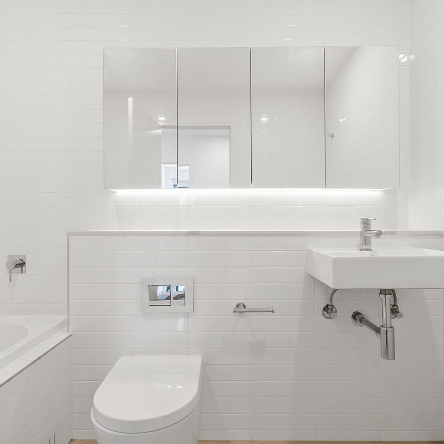 Bright and tranquil living in the modern 'Palais' community - Photo 1