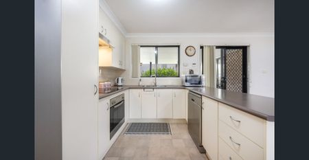 Beautifully Presented Brick and Tile Residence - Photo 4