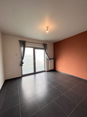 Gelijkvloersappartement met 1 slpk, tuin en parking - Photo 2