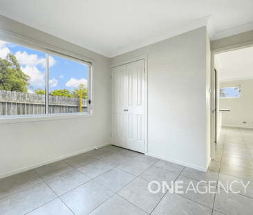 MODERN TWO-BEDROOM HOME WITH SPACIOUS LIVING - Photo 5