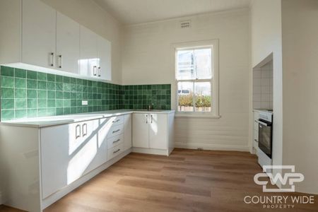Renovated Two Bedroom Home Ready Now! - Photo 2