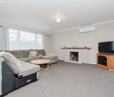 Comfortable Three-Bedroom Home with Peaceful Outdoor Living - Photo 3