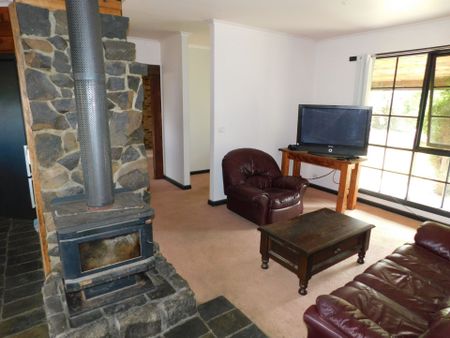 RURAL LIVING ON APPROX. 1.5 ACRES WITH TWO LIVING AREAS, ELECTRICITY & WATER INCLUDED IN RENT - Photo 3