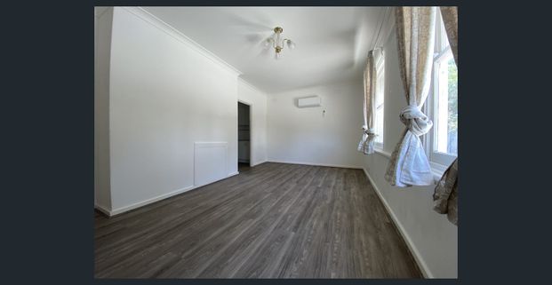 Renovated Family Home with Premium Security & Space - Photo 1