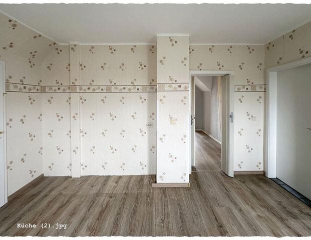 BUSCH-IMMOBILIEN ~ Einliegerwohnung mit Grundstücksnutzung! - Foto 1