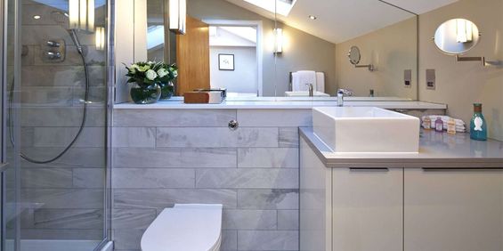 An impressive and modern one bedroom, one bathroom apartment on the 1st floor of this modern building across the street from the iconic Harrods store. - Photo 3