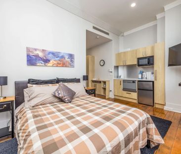 Heritage CBD Studio with Resort-Style Facilities - Photo 2