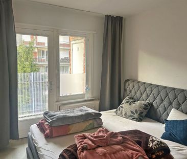 Appartement met 2 slaapkamers en terras aan het Rivierenhof! - Photo 2