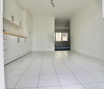 Lichtrijk appartement met 1 slpk, terras en garage* voor 720 EUR/mnd - Photo 4