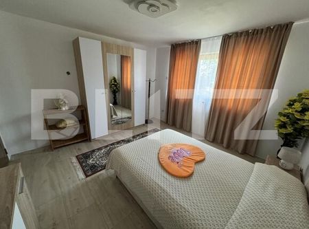 Apartament la casa P+1 cu 3 camere, 140 mp, zona Plaiul Vulcanesti - Fotografie 3