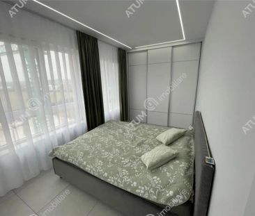 De inchiriat apartament tip penthouse cu 2 camere terasa si loc de parcare in zona Calea Surii Mici din Sibiu - Photo 4