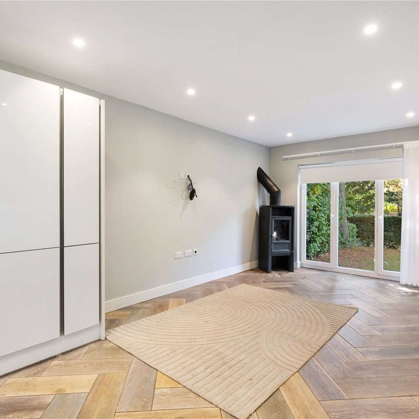 Exceptional contemporary home set within private gardens on one of Wilmslow's most prestigious roads - Photo 1