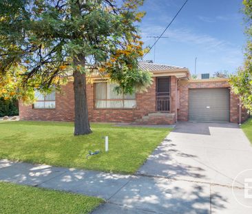 RENOVATED EASY CARE UNIT, CLOSE TO THE UNIVERSITY - Photo 2