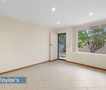 WELL MAINTAINED & IN SMALL GROUP OF 3 UNITS - Photo 1