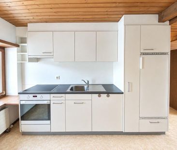 Charmante Dachwohnung in ruhigem 3-Parteien-Haus - Foto 1