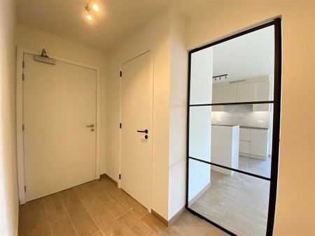 Nieuwbouwappartement met 2 slaapkamers, kelderberging en ondergrondse autostaanplaats - Foto 2