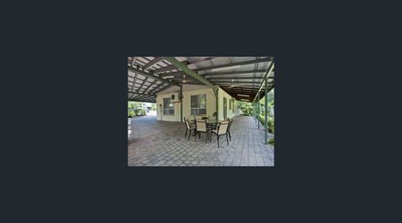 BEAUTIFULLY PRESENTED TROPICAL FAMILY OASIS IN SOUGHT-AFTER MOULDEN - Photo 5