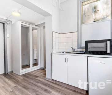 SELF CONTAINED, RENOVATED AND FURNISHED STUDIO - Photo 2