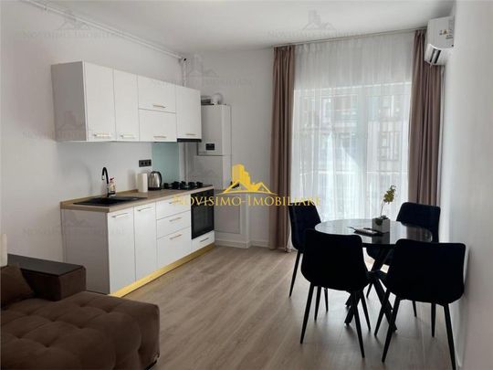 APARTAMENT DE INCHIRIAT CU DOUA CAM IN ZONA SEMICENTRALA de inchiriat - Fotografie 1