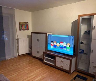 Geräumige 2 ZKB mit Terrasse und Blick auf den Mühlenbach in innens... - Foto 1