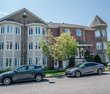 Grand condo 3 1/2 + - Photo 3