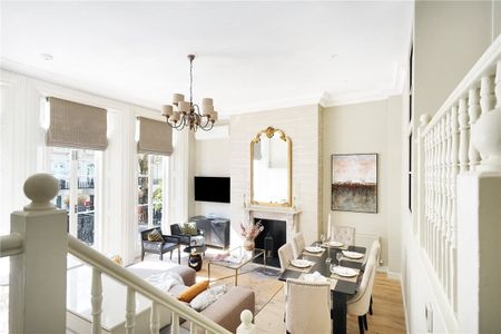 An exceptional and immaculate four bedroom splitlevel duplex situated on the favoured first and upper ground floors. It is full of period features such as the double height ceilings. Minimum Tenancy Length: 12 months EPC rating: C | Council Tax Band H - Photo 4