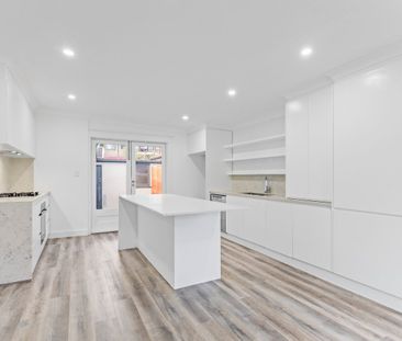 LARGE, FRESHLY PAINTED FOUR BEDROOM HOME IN PRIME LOCATION ! - Photo 5