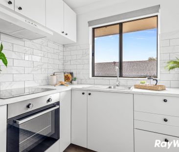 Renovated top-floor unit positioned at the rear of the complex, wal... - Photo 5