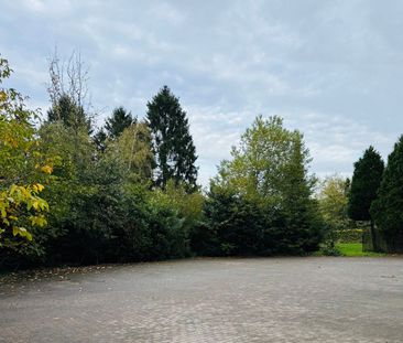 Gelijkvloers 3 slaapkamer appartement met grote garage. - Foto 1