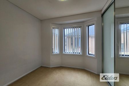 Modern 3-Bedroom Brick Townhouse with Double Lock-Up Garage - Photo 2