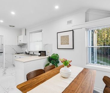 Impressive Stylish Four Bedroom Home in Perfect Location! - Photo 6