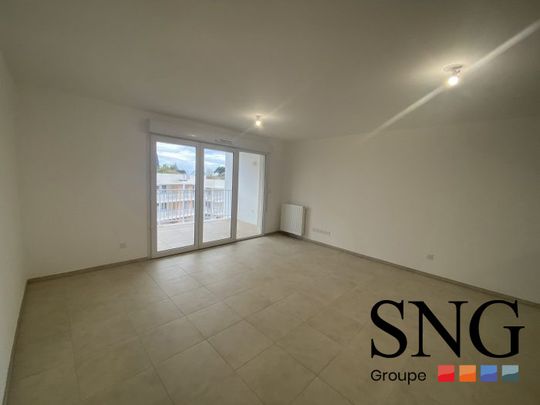 T3 AVEC LOGGIA + PARKINGS - Photo 1