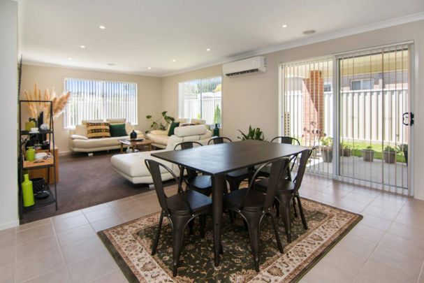 A PERFECT NEAT AND TIDY FAMILY HOME IN PRIME LOCATION - APPLICATION PENDING - Photo 1