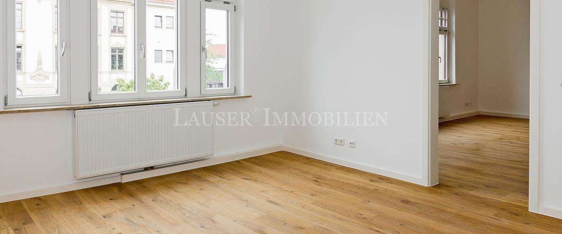 Attraktive Drei-Zimmer-Altbauwohnung mit Balkon in kernsaniertem Haus - Foto 1