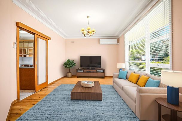 Air-Conditioned Four-Bedroom Family Home with Two Living Areas, Single Carport and Tandem Garage! - Photo 1