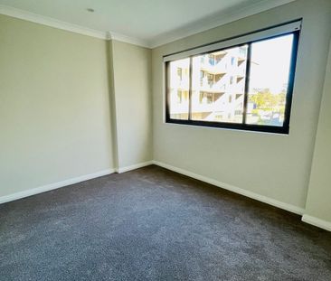 OVERSIZED TWO BEDROOM WITH TWO BASEMENT PARKING FOR LEASE - Photo 1