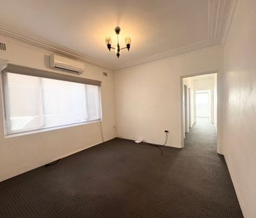 Charming Kingsgrove above shop 2-bedroom Unit with Retro Charm - Photo 1