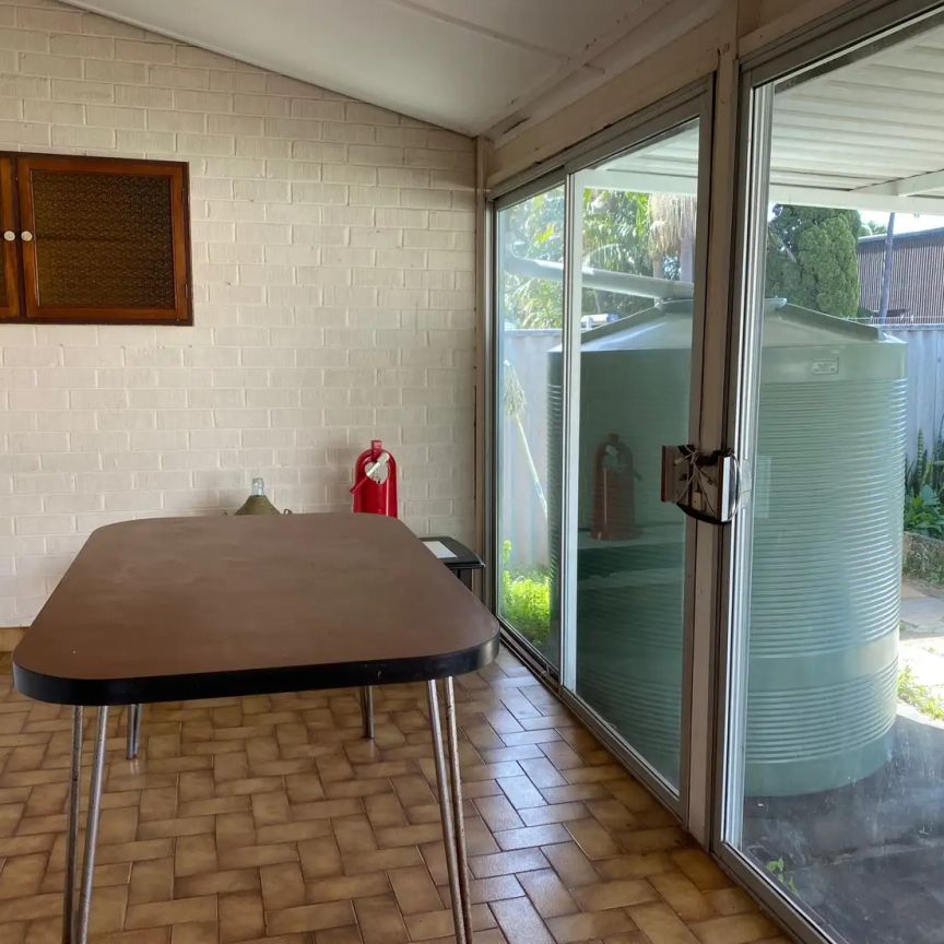 “Charming 2-Bedroom Home with Sunroom and Lovely Gardens” - Photo 1