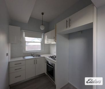 Spacious 2-Bedroom Duplex in Convenient Location - Photo 1