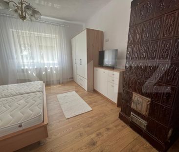 Casă de închiriat, 110 mp, 2 dormitoare, curte și parcare - Photo 3