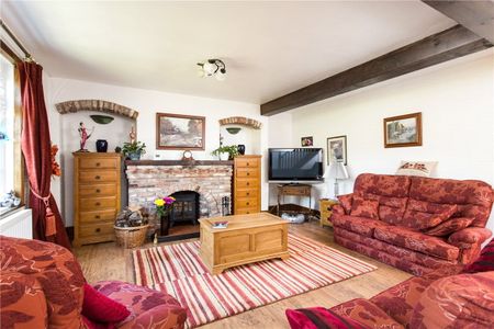A charmingly traditional cottage with fabulous views over The Green, just on the edge of this charming rural village, only 8 miles south of York. - Photo 3
